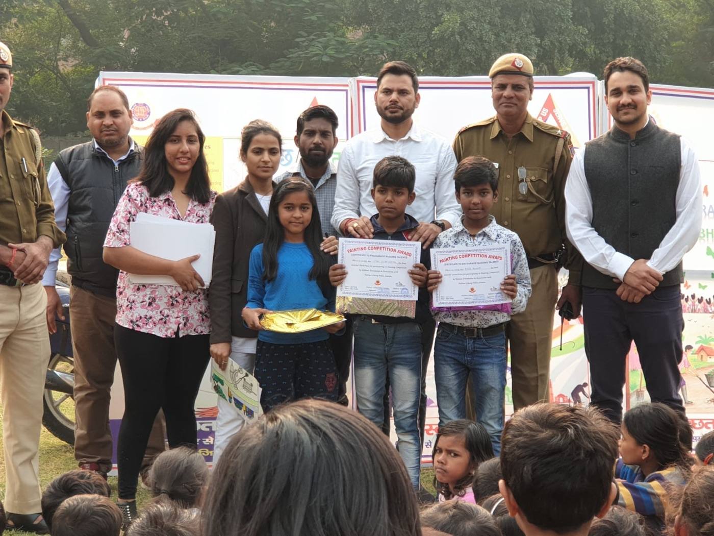 Awarding young talent at a painting competition held in association with the Delhi Police.